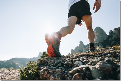 Cool man with tattoos ultra trail runner