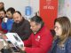 Funcionarios municipales visitando locales comerciales en Los Vilos para aplicar la ficha FEEC tras las lluvias