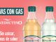 Botellas de agua Benedictino con gas en sabores de manzana y limón sobre fondo fresco