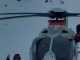 Helicóptero de Carabineros de Chile realizando labores de rescate en zona cordillerana nevada