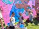Niños y jóvenes participando en actividades artísticas y recreativas en el Parque Urbano de Tierras Blancas durante el Picnic Cultural.