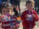 Niños en una escuela recibiendo apoyo del Estado bajo el Bono de Apoyo a la Niñez