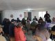 Trabajadores y autoridades revisando el plano de la ruta D-713 en Punitaqui