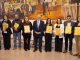 Funcionarios de la educacion de Paihuano recibiendo reconocimiento por trayectoria junto al SLEP Elqui y gremios.